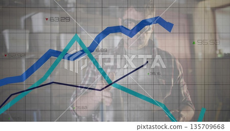Middle-aged man wearing plaid shirt analyzing line chart overlay in office, with arrow icons 135709668