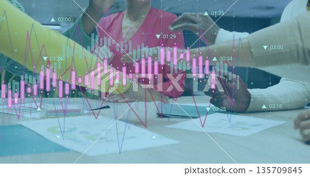 Discussing charts team wearing business attire using tablet smartphone pens in conference room 135709845