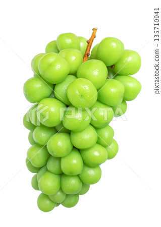 Fresh green grapes on stem against white background 135710941