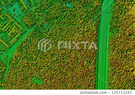 gis 3d. The road in the forest area is shown on a 3D map made by a quadcopter. 135711281