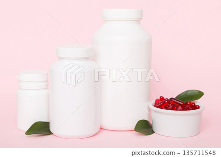 different drugs and health supplement pills with medicine bottle health care and medical top view. Vitamin tablets. Bottle with colored pills on table background. Multivitamins different drugs and health supplement pills with medicine bottle health care and medical top view. Vitamin tablets. Bottle with colored pills on table background. Multivitamins 135711548