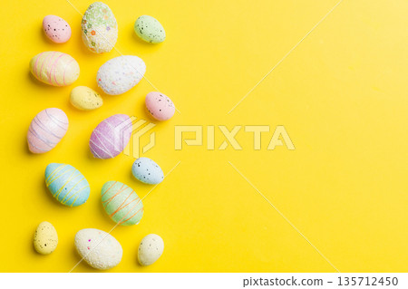 Happy Easter concept. Preparation for holiday. Easter eggs on colored background. flat lay top view copy space banner 135712450