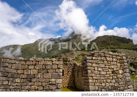 Ancient terraces and stone walls inside the Machu Picchu site in Peru Ancient terraces and stone walls inside the Machu Picchu site in Peru 135712739
