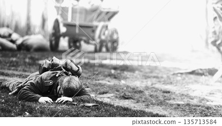 German Infantry Soldier In World War Ii. Re-enactor Dressed As German Wehrmacht Soldier Lies Slain In Reconstruction Of Battles World War Ii. Win Of Soviet Army In War. Black And White Video 135713584