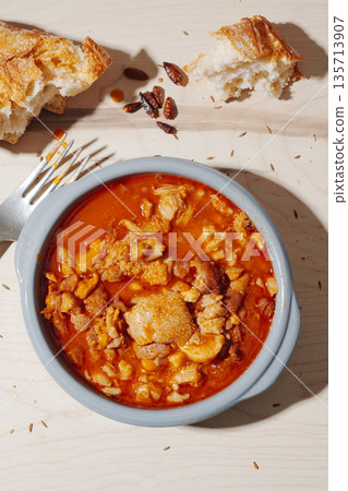 Spanish callos served hot in a small bowl Spanish callos served hot in a small bowl 135713907
