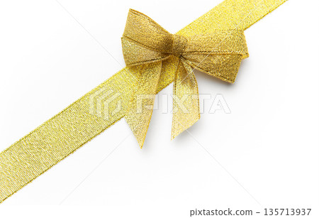 Gold glitter ribbon and bow on white background 135713937