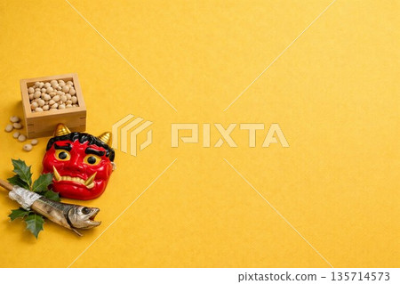 Setsubun beans, red demon mask, and holly sardines placed on a yellow background Setsubun beans, red demon mask, and holly sardines placed on a yellow background 135714573