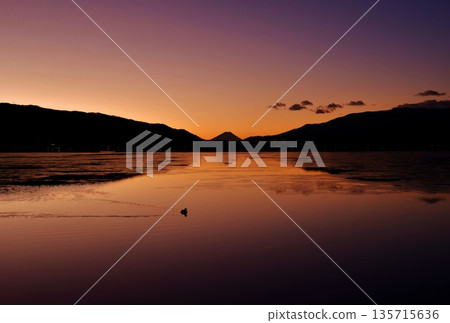 Mount Fuji at dawn as seen from Lake Suwa Mount Fuji at dawn as seen from Lake Suwa 135715636