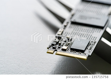 High-speed storage M.2 NVMe SSD close-up High-speed storage M.2 NVMe SSD close-up 135715758