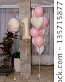 Pink and Beige Balloon Decorations for First Birthday Party with Heart Shapes and Number 1 Balloon in Modern Home Setting 135715877
