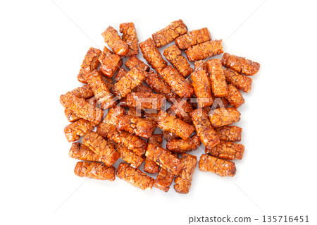 Tamari soy sauce flavored hard-baked rice crackers Tamari soy sauce flavored hard-baked rice crackers 135716451