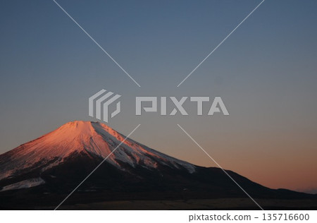 Mount Fuji at Lake Yamanaka in the light of dawn Mount Fuji at Lake Yamanaka in the light of dawn 135716600