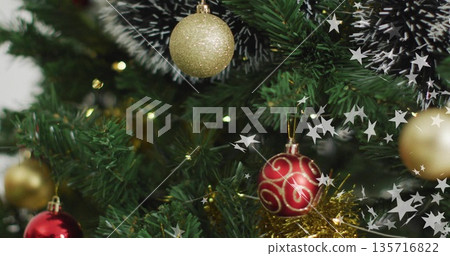 Christmas tree with ornaments and twinkling stars image Christmas tree with ornaments and twinkling stars image 135716822