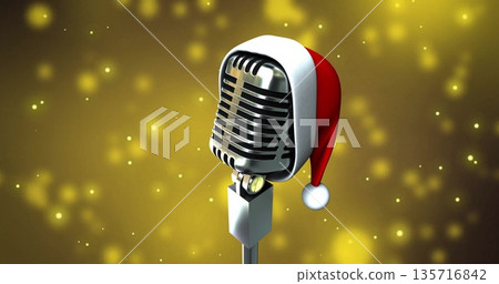 Image of microphone with santa hat over yellow spots Image of microphone with santa hat over yellow spots 135716842