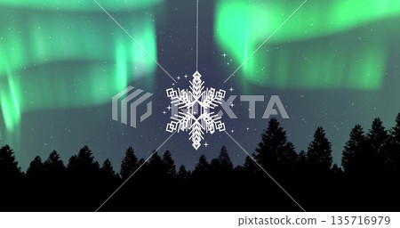 Image of hanging snowflakes over fir trees Image of hanging snowflakes over fir trees 135716979
