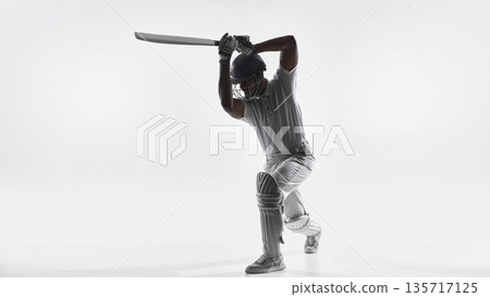 Cricket batsman overhead swing preparation in studio isolated on white. 135717125