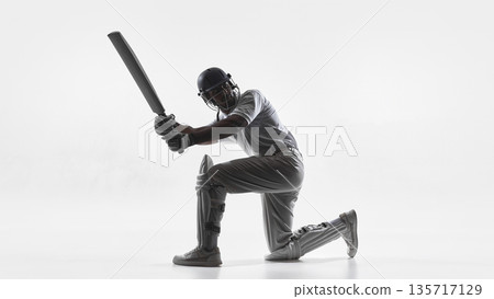 Cricket player kneeling shot with bat in studio isolated on white. 135717129
