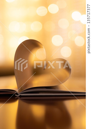 Elegant golden Valentine heart from folded book pages, soft glowing bokeh lights, romantic love background, luxury holiday decoration, dreamy artistic banner wallpaper Elegant golden Valentine heart from folded book pages, soft glowing bokeh lights, romantic love background, luxury holiday decoration, dreamy artistic banner wallpaper 135717377
