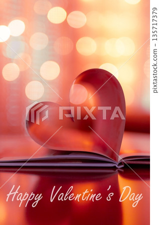 Romantic vertical red Valentine Day heart from folded book pages, glowing warm bokeh blur, soft love lights background, dreamy holiday banner with love quotes Romantic vertical red Valentine Day heart from folded book pages, glowing warm bokeh blur, soft love lights background, dreamy holiday banner with love quotes 135717379