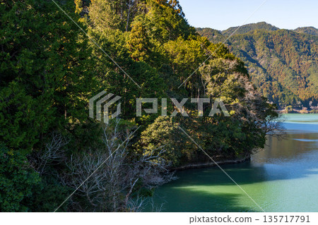 Funaaki Dam Lake, Hamamatsu City, Shizuoka Prefecture. The dam lake from the Bridge of Dreams in winter. Funaaki Dam Lake, Hamamatsu City, Shizuoka Prefecture. The dam lake from the Bridge of Dreams in winter. 135717791