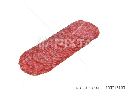 Dry-cured sausage is cut into thin slices. Dry-cured sausage is cut into thin slices. 135718165