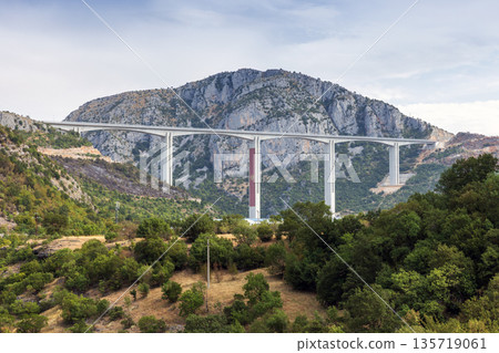 Landscape of Montenegro featuring a tall Moracica bridge Landscape of Montenegro featuring a tall Moracica bridge 135719061