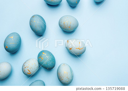 Easter background of eggs painted in blue color. Easter background of eggs painted in blue color. 135719088
