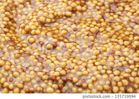 Dijon Mustard seeds close-up Dijon Mustard seeds close-up 135719094