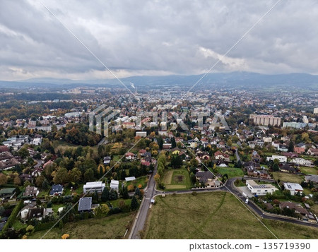 neighborhood link with open green spaces, community pathway across fields with clustered residences neighborhood link with open green spaces, community pathway across fields with clustered residences 135719390