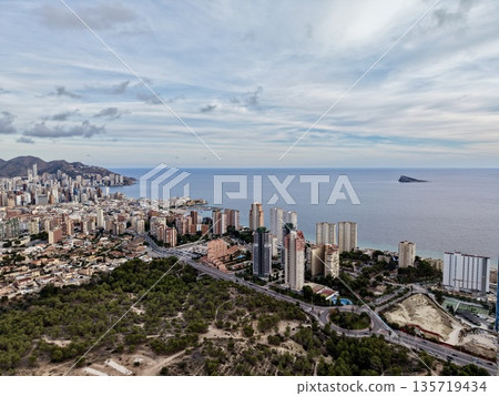 vast coastal scenery with urban elements, expansive aerial landscape showcasing coast and urban development 135719434