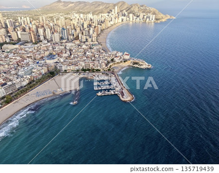 seaside port scene, harbor view with promenade, coastal bay featuring piers and sunlit facades seaside port scene, harbor view with promenade, coastal bay featuring piers and sunlit facades 135719439