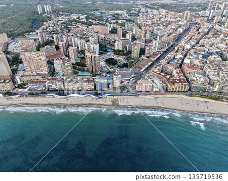 lively seaside promenade view, tourism advertisement showcasing coastal attractions during daylight lively seaside promenade view, tourism advertisement showcasing coastal attractions during daylight 135719536