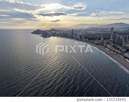 golden hour cityscape reflections, urban waterfront view showcasing shimmering reflections during sunset golden hour cityscape reflections, urban waterfront view showcasing shimmering reflections during sunset 135719541