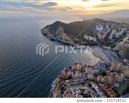 sunset coastal scenery, captivating aerial view of sunset illuminating coastline and expansive sky sunset coastal scenery, captivating aerial view of sunset illuminating coastline and expansive sky 135719552