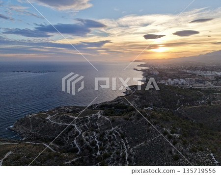 scenic coastal hiking, dusk view of trails and nature, highland ridge with pathways and ocean view scenic coastal hiking, dusk view of trails and nature, highland ridge with pathways and ocean view 135719556