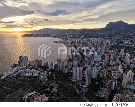 opulent seaside cityscape showcase, lavish beachfront skyline panorama highlighted by golden dusk lighting opulent seaside cityscape showcase, lavish beachfront skyline panorama highlighted by golden dusk lighting 135719563