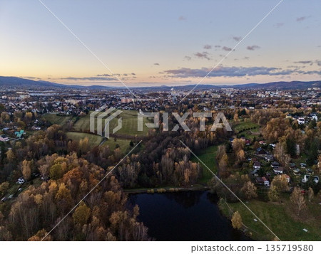 aerial townscape scenery, photographic aerial view highlighting town and natural surroundings 135719580