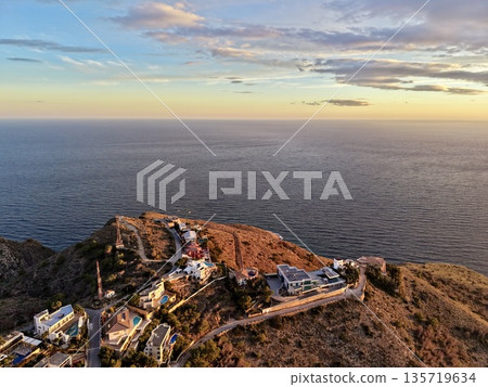 serene neighborhood set amidst dramatic rocky cliffs providing panoramic ocean vistas and relaxation amenities 135719634