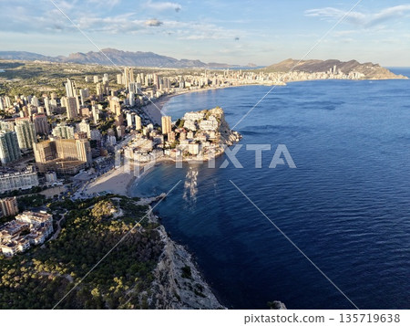 scenic aerial view of bustling coastal metropolis with shimmering water and lively atmosphere scenic aerial view of bustling coastal metropolis with shimmering water and lively atmosphere 135719638