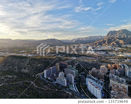 morning city skyline with hills in background, sunrise over urban hills creating vibrant city backdrop morning city skyline with hills in background, sunrise over urban hills creating vibrant city backdrop 135719649