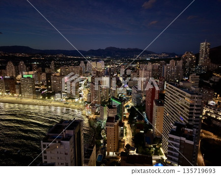 urban nocturnal scene, bright harbor reflections with bustling nighttime activity and neon glow urban nocturnal scene, bright harbor reflections with bustling nighttime activity and neon glow 135719693