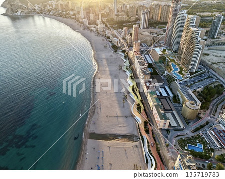 morning light highlights picturesque shoreline with innovative architecture and inviting azure sea morning light highlights picturesque shoreline with innovative architecture and inviting azure sea 135719783