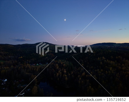 serene night sky with lone lunar glow, tranquil nocturnal landscape atop lush mountain ridges serene night sky with lone lunar glow, tranquil nocturnal landscape atop lush mountain ridges 135719852
