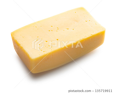 piece of cheese close-up on a white isolated piece of cheese close-up on a white isolated 135719911