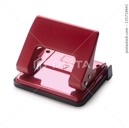 paper hole punch on a white isolated paper hole punch on a white isolated 135719941