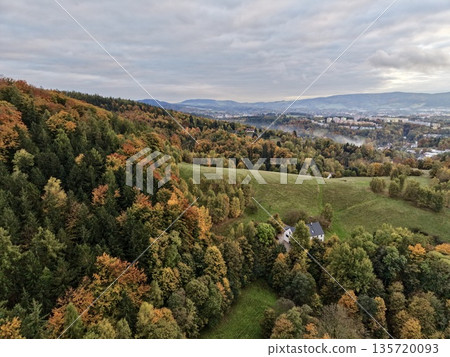 rolling hills transitioning to urban environment, elevated landforms leading to bustling town and forests rolling hills transitioning to urban environment, elevated landforms leading to bustling town and forests 135720093
