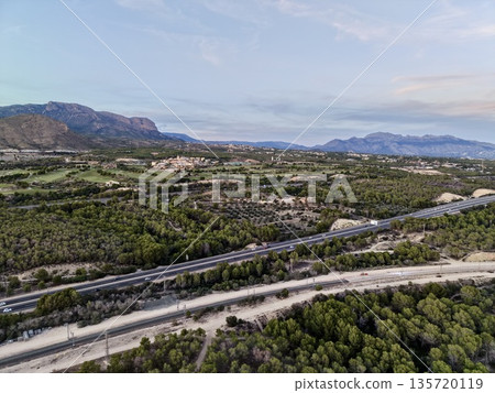 skyway with busy lanes, linear perspective showcasing modern infrastructure and seamless connectivity 135720119
