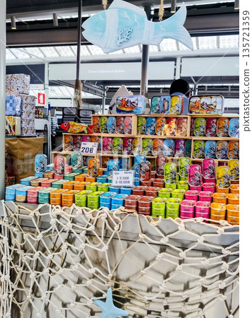 Display of colorful canned fish stacked in a market in Porto, Portugal Display of colorful canned fish stacked in a market in Porto, Portugal 135721359