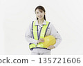 A young Japanese woman wearing a safety belt and helmet in work clothes against a white background 135721606