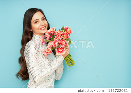 Happy beauty woman with pink tulip bouquet Happy beauty woman with pink tulip bouquet 135722081